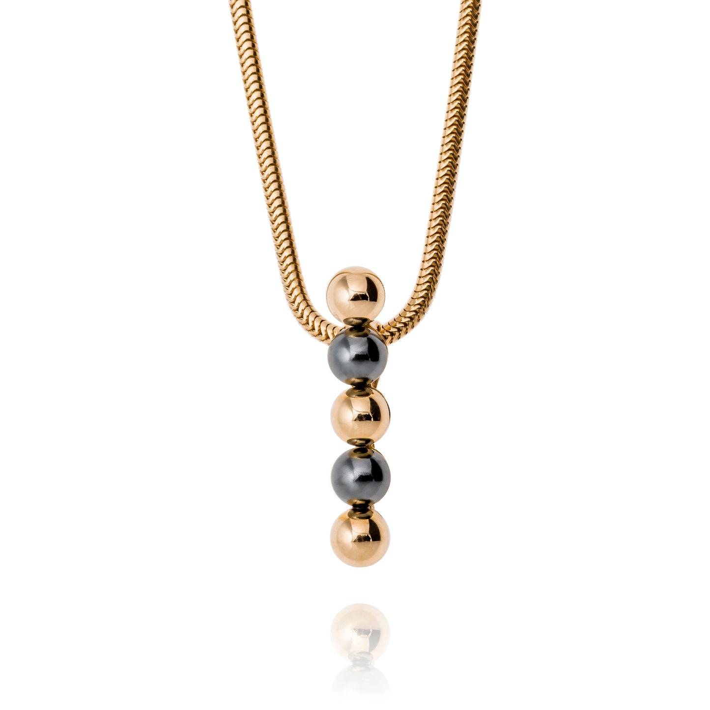 Tale about the pendant in gold with gold balls and hematites